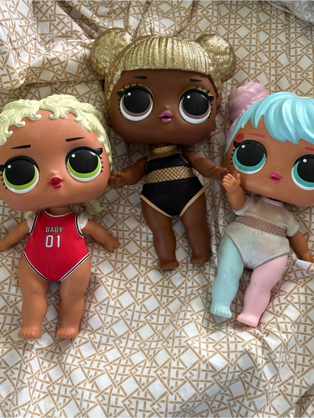 L.O.L. Surprise! Dolls in Gold, Red, and Pastel Blue